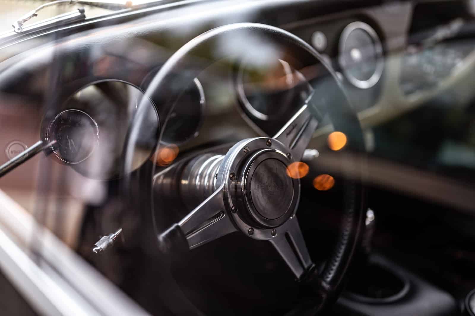 black and silver steering wheel